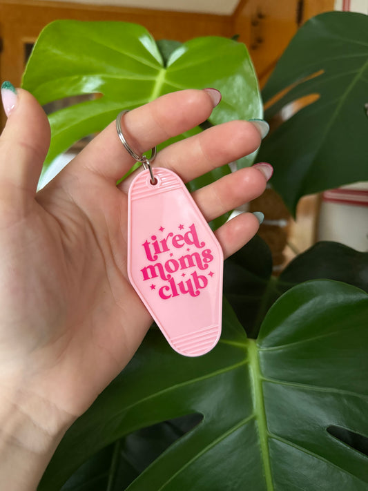 “Tired moms club” motel keychain